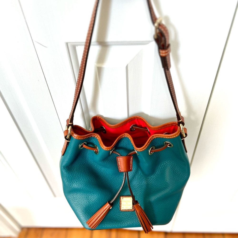NWOT Dooney and Bourke bucket bag! Perfect condition !